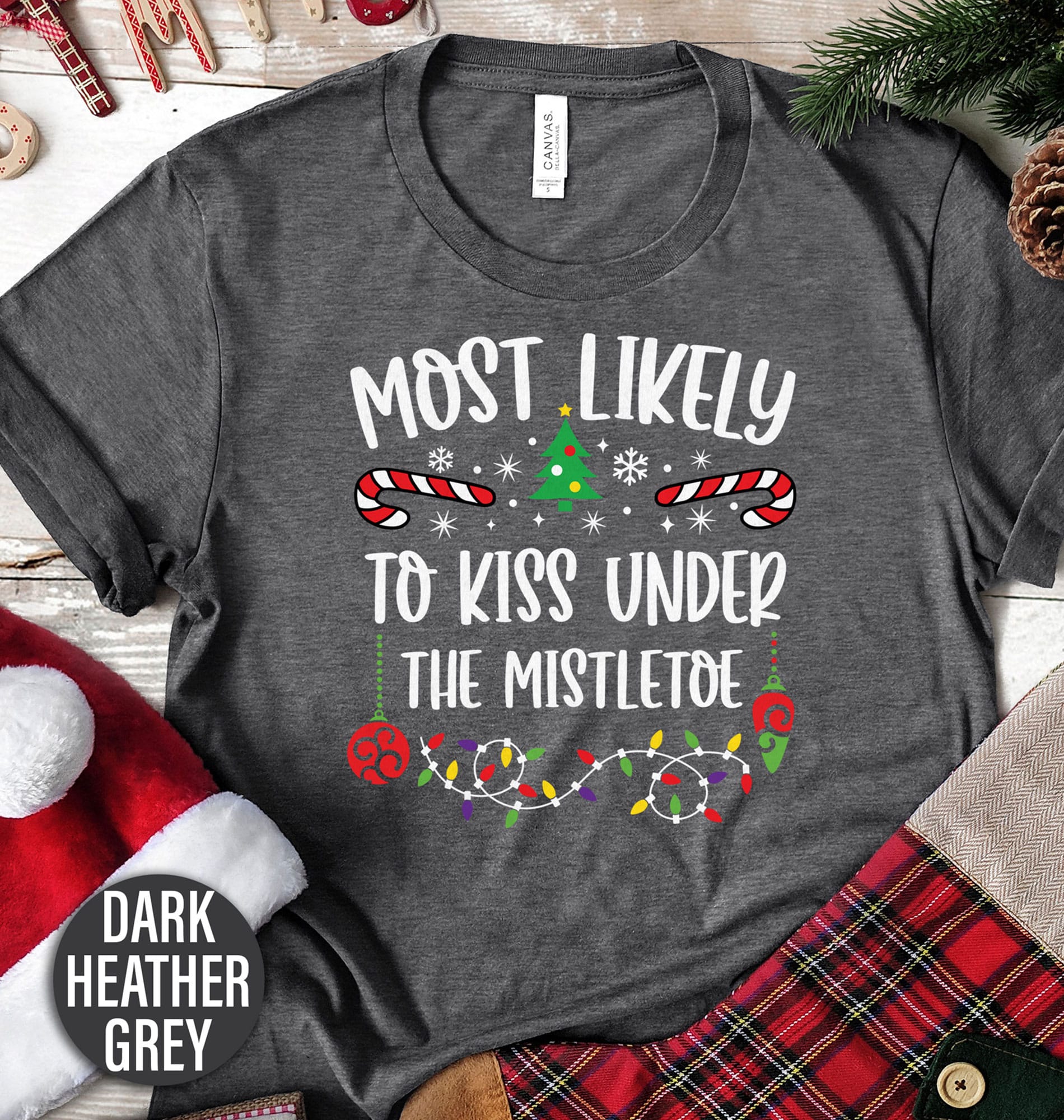 Most Likely To Kiss Under The Mistel Toe Christmas T Shirt