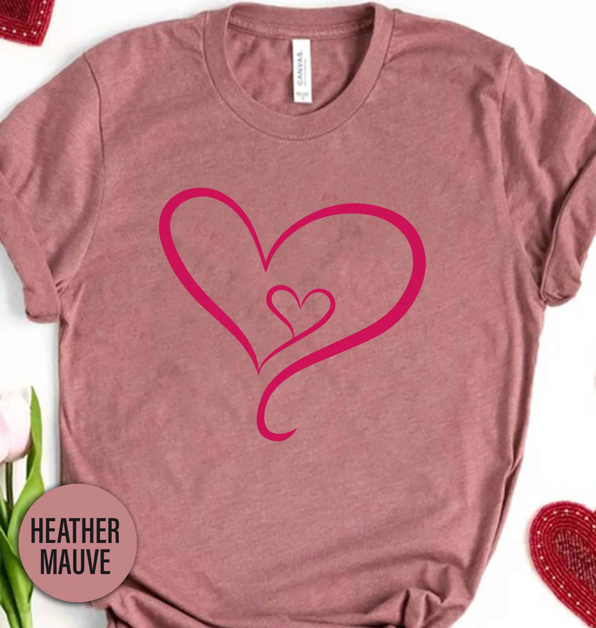 Celebrate Valentine's Day in style with our Love Heart Valentines Day t shirt! This Heart t